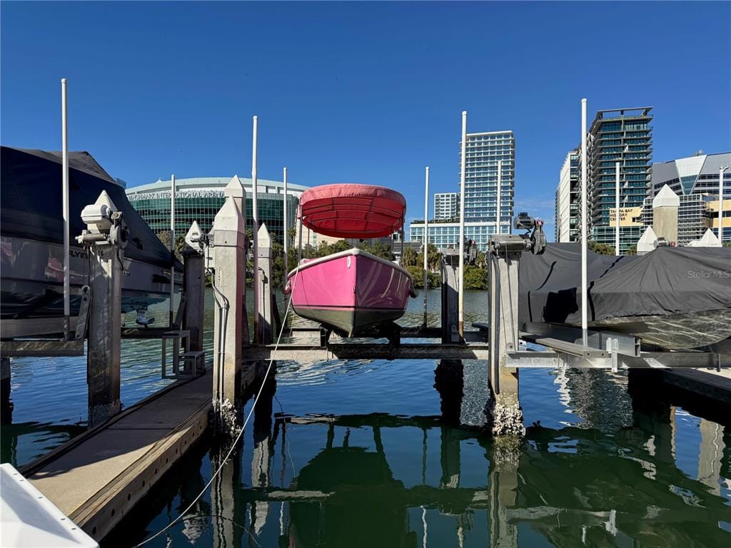 Wide view of Crimson Harbour Marina Tampa boat slips with downtown skyline